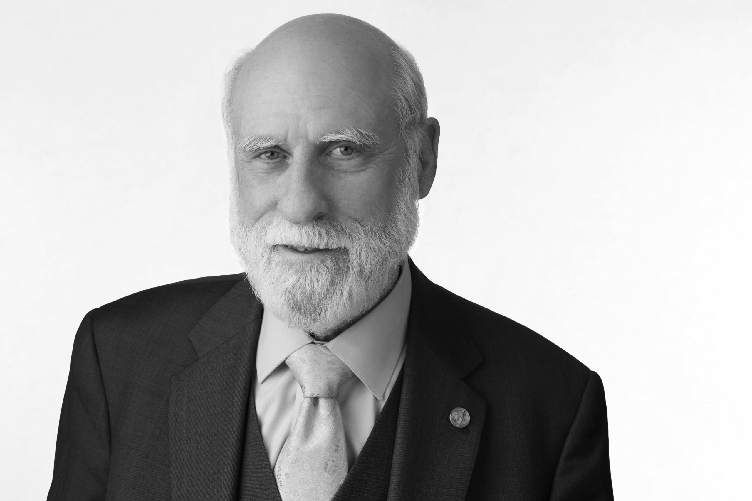 Headshot of Vinton G. Cerf in one of his signature three-piece suits.