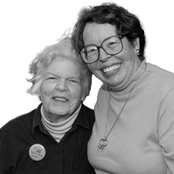 Phyllis Lyon & Del Martin pose happily together.