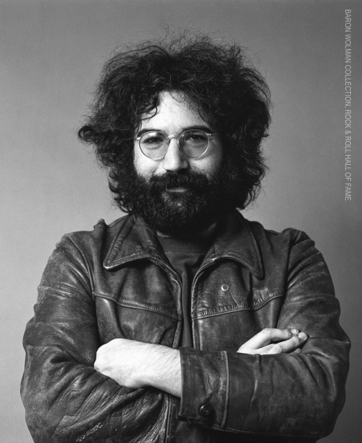 Headshot of a young Jerry Garcia wearing a leather jacket.