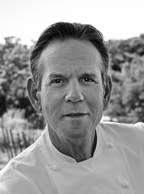 Headshot of Thomas Keller wearing a chef coat.