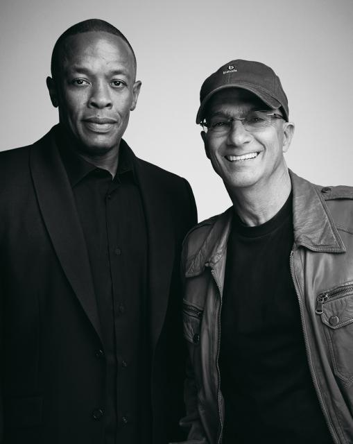 Jimmy Iovine and Andre “Dr. Dre” Young in black and white, wearing dark-colored clothing and looking into the camera