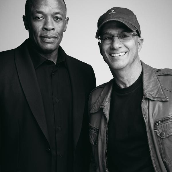 Jimmy Iovine and Andre “Dr. Dre” Young in black and white, wearing dark-colored clothing and looking into the camera