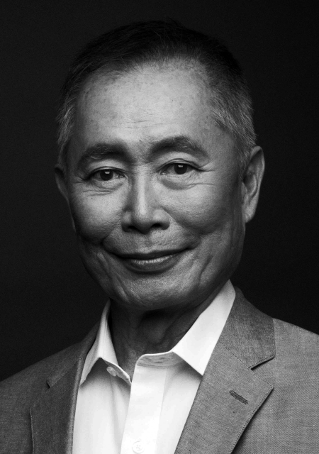 Headshot of George Takei wearing a suit.