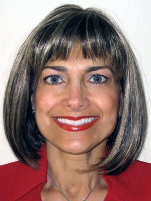 Headshot of a smiling Natasha Fooman.