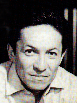 Headshot of Pablo Espinoza with a soft gaze.